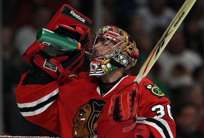 CHICAGO, IL - DECEMBER 30: Marty Turco #30 of the Chicago Blackhawks drinks water during a break in the action against the San Jose Sharks at the United Center on December 30, 2010 in Chicago, Illinois. The Sharks defeated the Blackhawks 5-3. (Photo by Jonathan Daniel/Getty Images)