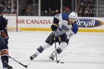 EDMONTON, CANADA - DECEMBER 21:  Andy McDonald #10 of the St. Louis Blues plays the puck across the blueline during their NHL game against the Edmonton Oilers on December 21, 2009 at Rexall Place in Edmonton, Alberta, Canada. (Photo by Dale MacMillan/Getty Images)