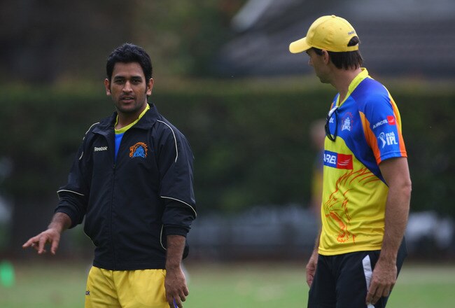 CAPE TOWN, SOUTH AFRICA - APRIL 16:  Mahendra Singh Dhoni of Chennai chats to coach Stephen Fleming during the Chennai Super Kings training session at the Vineyard Cricket Ground on April 16, 2009 in Cape Town, South Africa.  (Photo by Tom Shaw/Getty Images)