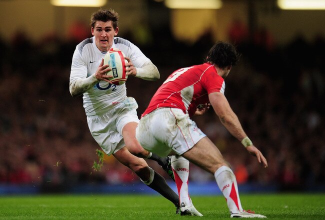 CARDIFF, WALES - FEBRUARY 04:  Toby Flood of England surges forward during the RBS 6 Nations Championship match between Wales and England at the Millennium Stadium on February 4, 2011 in Cardiff, Wales.  (Photo by Shaun Botterill/Getty Images)