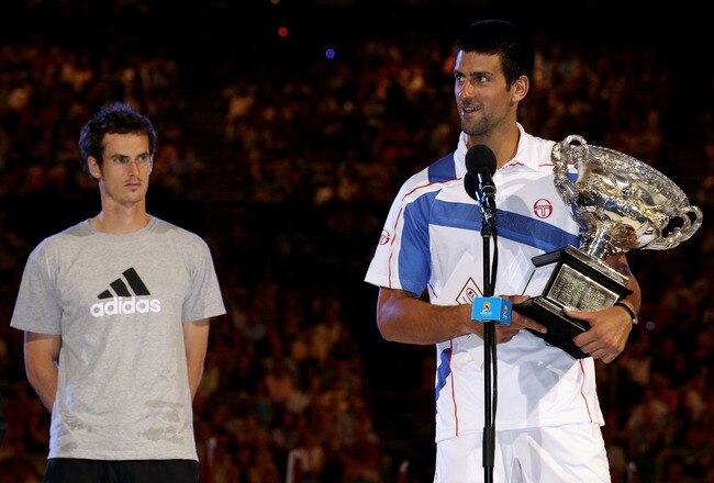 MELBOURNE, AUSTRALIA - JANUARY 30:  Novak Djokovic of Serbia (R) poses with the Norman Brookes Challenge Cup after winning his men's final match against Andy Murray of Great Britain (L) during day fourteen of the 2011 Australian Open at Melbourne Park on January 30, 2011 in Melbourne, Australia.  (Photo by Clive Brunskill/Getty Images)