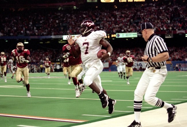 5 Jan 2000:  Michael Vick #7 of the Virginia Tech Hokies runs with the ball during the Nokita Sugar Bowl Game against the Florida State Seminoles at the Louisiana Superdome in New Orleans, Louisiana. The Seminoles defeated the Hokies 46-29. Mandatory Credit: Brian Bahr  /Allsport