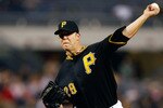 PITTSBURGH - SEPTEMBER 21:  Paul Maholm #28 of the Pittsburgh Pirates pitches against the St. Louis Cardinals during the game on September 21, 2010 at PNC Park in Pittsburgh, Pennsylvania.  (Photo by Jared Wickerham/Getty Images)