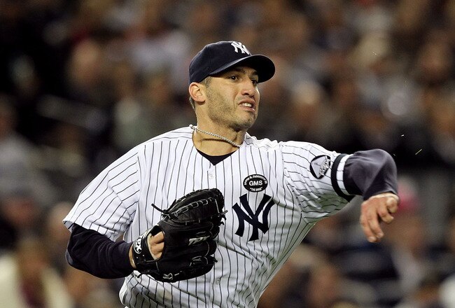 NEW YORK - OCTOBER 18:  Starting pitcher Andy Pettitte #46 of the New York Yankees throws the ball to first base for a force out against the Texas Rangers in Game Three of the ALCS during the 2010 MLB Playoffs at Yankee Stadium on October 18, 2010 in New York, New York.  (Photo by Al Bello/Getty Images)