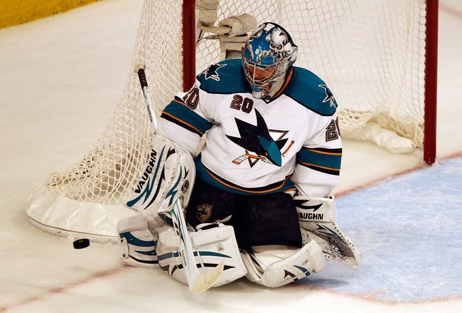 CHICAGO - MAY 23:  Goaltender Evgeni Nabokov #20 of the San Jose Sharks makes a save while taking on the Chicago Blackhawks in Game Four of the Western Conference Finals during the 2010 NHL Stanley Cup Playoffs at the United Center on May 23, 2010 in Chicago, Illinois.  (Photo by Jonathan Daniel/Getty Images)