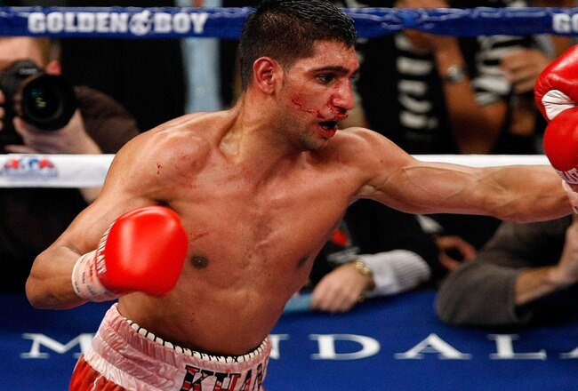 LAS VEGAS - DECEMBER 11:  (L-R) Amir Khan of England throws a left to the face of Marcos Maidana of Argentina during the WBA super lightweight title fight at Mandalay Bay Events Center on December 11, 2010 in Las Vegas, Nevada.  (Photo by Ethan Miller/Getty Images)