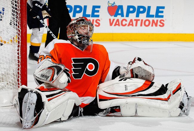 PHILADELPHIA, PA - FEBRUARY 03:  Marcel Goc #9 of the Nashville Predators skates to teammates to celebrate scoring a goal as Goalie Sergei Bobrovsky #35 of the Philadelphia Flyers sits on the ice during the first period of an NHL hockey game at the Wells Fargo Center on February 3, 2011 in Philadelphia, Pennsylvania.  (Photo by Paul Bereswill/Getty Images)