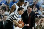 CHAPEL HILL, NC - MARCH 9:  Head Coach Mike Krzyzweski of the Duke Blue Devils yells at the official as Rashad McCants #32 of the University of North Carolina Tar Heels watches on March 9, 2003 at the Dean E. Smith Center in Chapel Hill, North Carolina.  (Photo by Craig Jones/Getty Images)