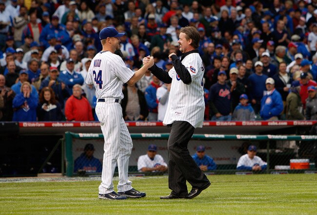 CHICAGO - OCTOBER 01:  Former Chicago Cubs pitcher Rick Sutcliffe greets Kerry Wood #34 of the Chicago Cubs after Suttcliffe threw out the ceremonial first pitch prior to the Cubs playing against the Los Angeles Dodgers in Game One of the NLDS during the 2008 MLB Playoffs at Wrigley Field on October 1, 2008 in Chicago, Illinois.  (Photo by Jamie Squire/Getty Images)