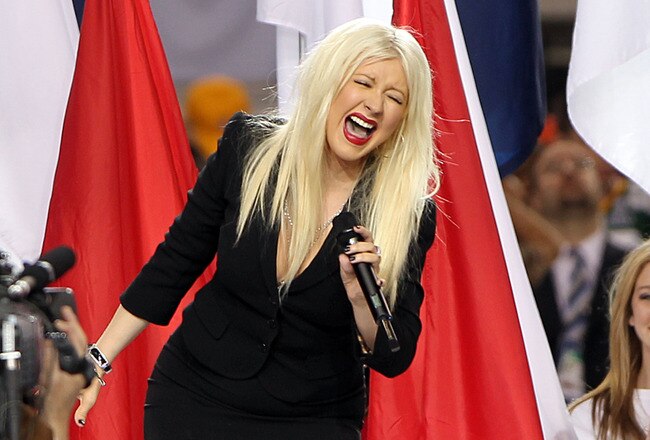 ARLINGTON, TX - FEBRUARY 06:  Singer Christina Aguilera performs during the Bridgestone Super Bowl XLV Pregame Show at Dallas Cowboys Stadium on February 6, 2011 in Arlington, Texas.  (Photo by Christopher Polk/Getty Images)