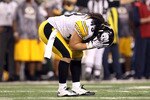 ARLINGTON, TX - FEBRUARY 06:  Troy Polamalu #43 of the Pittsburgh Steelers reacts against the Green Bay Packers during the third quarter of Super Bowl XLV at Cowboys Stadium on February 6, 2011 in Arlington, Texas.  (Photo by Ronald Martinez/Getty Images)