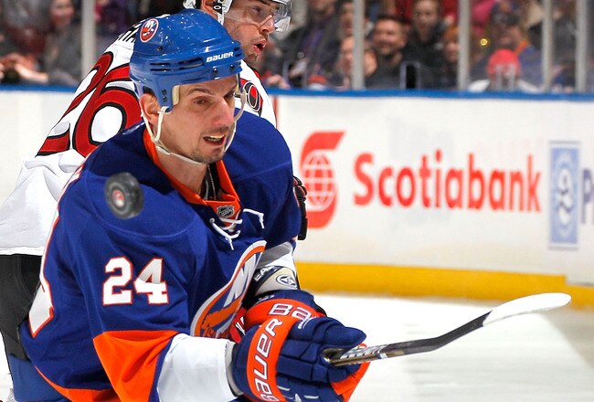 UNIONDALE, NY - FEBRUARY 05:  Radek Martinek #24 of the New York Islanders skates during an NHL hockey game against the Ottawa Senators at Nassau Coliseum on February 5, 2011 in Uniondale, New York.  (Photo by Paul Bereswill/Getty Images)