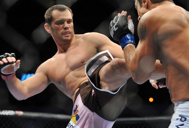DALLAS - SEPTEMBER 19:  UFC fighter Vitor Belfort (R) battles UFC fighter Rich Franklin (L) during their Catch weight bout at UFC 103: Franklin vs. Belfort at the American Airlines Center on September 19, 2009 in Dallas, Texas.  (Photo by Jon Kopaloff/Getty Images)