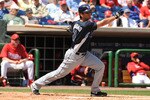 CLEARWATER, FL - MARCH 23: Outfielder Justin Ruggiano #11 of the Tampa Bay Rays bats against the Philadelphia Phillies March 23, 2010 at Bright House Field in Clearwater, Florida. (Photo by Al Messerschmidt/Getty Images)