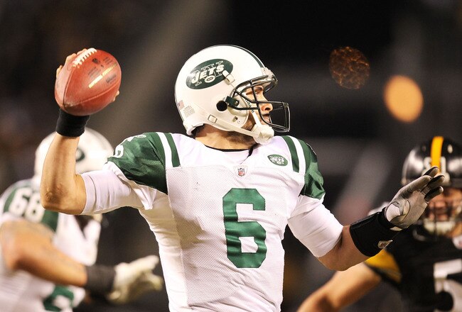 PITTSBURGH, PA - JANUARY 23:  Mark Sanchez #6 of the New York Jets drops back during their 19 to 24 loss to the Pittsburgh Steelers in the 2011 AFC Championship game at Heinz Field on January 23, 2011 in Pittsburgh, Pennsylvania.  (Photo by Ronald Martinez/Getty Images)