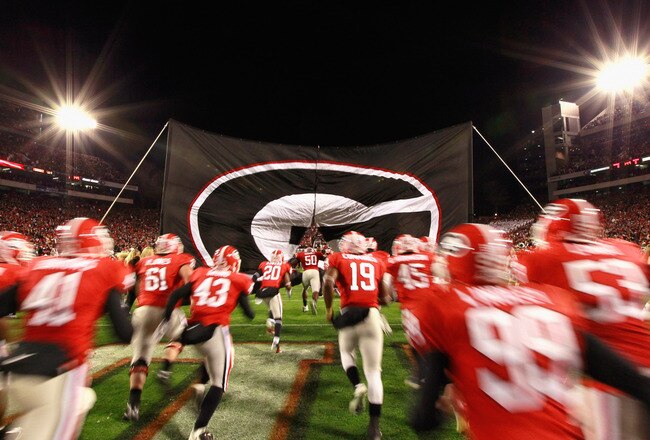 ATHENS, GA - NOVEMBER 27:  The Georgia Bulldogs enter the field to face the Georgia Tech Yellow Jackets at Sanford Stadium on November 27, 2010 in Athens, Georgia.  (Photo by Kevin C. Cox/Getty Images)