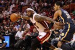 MIAMI, FL - FEBRUARY 08:  LeBron James #6 of the Miami Heat dribbles around Danny Granger #33 of the Indiana Pacers during a game at American Airlines Arena on February 8, 2011 in Miami, Florida. NOTE TO USER: User expressly acknowledges and agrees that, by downloading and/or using this Photograph, User is consenting to the terms and conditions of the Getty Images License Agreement.  (Photo by Mike Ehrmann/Getty Images)