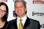 LAS VEGAS, NV - DECEMBER 01:  Sam Phillips (L) and Ultimate Fighting Championship octagon announcer Bruce Buffer arrive at the third annual Fighters Only World Mixed Martial Arts Awards 2010 at the Palms Casino Resort December 1, 2010 in Las Vegas, Nevada.  (Photo by Ethan Miller/Getty Images)