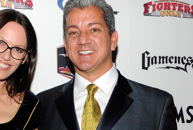 LAS VEGAS, NV - DECEMBER 01:  Sam Phillips (L) and Ultimate Fighting Championship octagon announcer Bruce Buffer arrive at the third annual Fighters Only World Mixed Martial Arts Awards 2010 at the Palms Casino Resort December 1, 2010 in Las Vegas, Nevada.  (Photo by Ethan Miller/Getty Images)