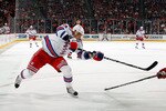 NEWARK, NJ - DECEMBER 29: Marion Gaborik #10 of the New York Rangers takes a shot during a game against the New Jersey Devils on December 29, 2010 at the Prudential Center in Newark, New Jersey. The Rangers won 3-1.  (Photo by Lou Capozzola/Getty Images)