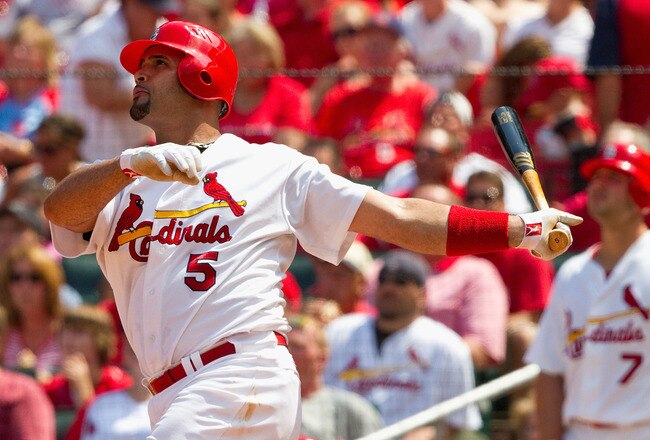 ST. LOUIS - AUGUST 1: Albert Pujols #5 of the St. Louis Cardinals hits a two-run home run against the Pittsburgh Pirates at Busch Stadium on August 1, 2010 in St. Louis, Missouri.  The Cardinals beat the Pirates 9-1.  (Photo by Dilip Vishwanat/Getty Images)