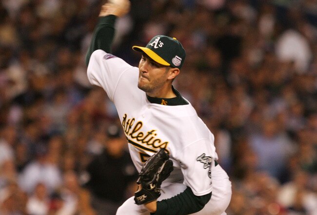 NEW YORK - JULY 15:  American League All-Star Justin Duchscherer #58 of the Oakland A's pitches during the 79th MLB All-Star Game at Yankee Stadium on July 15, 2008 in the Bronx borough of New York City.  (Photo by Jim McIsaac/Getty Images)