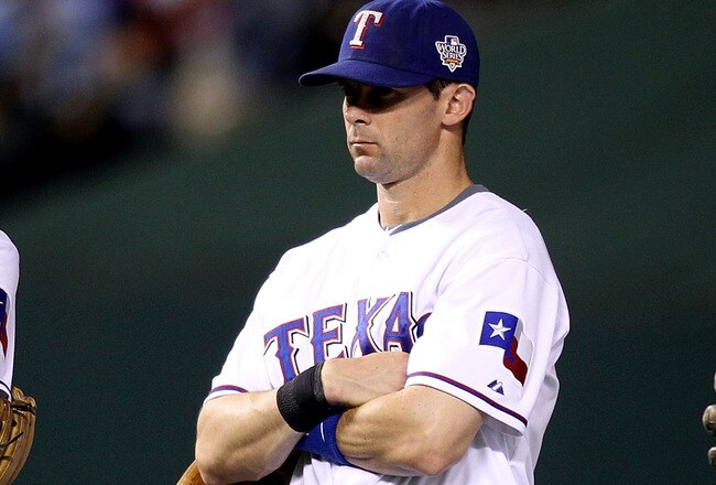 ARLINGTON, TX - OCTOBER 31:  (L-R) Elvis Andrus #1, Michael Young #10, Ian Kinsler #5 and Mitch Moreland #18 of the Texas Rangers wait during a pitching change against the San Francisco Giants in Game Four of the 2010 MLB World Series at Rangers Ballpark in Arlington on October 31, 2010 in Arlington, Texas.  (Photo by Christian Petersen/Getty Images)