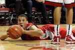 LAS VEGAS - FEBRUARY 10:  Phillip McDonald #23 of the New Mexico Lobos looks to pass after coming up with a loose ball during the team's 76-66 victory over the UNLV Rebels at the Thomas & Mack Center February 10, 2010 in Las Vegas, Nevada.  (Photo by Ethan Miller/Getty Images)