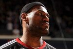 SACRAMENTO, CA - DECEMBER 11:  Lebron James #6 of the Miami Heat stands for the National Anthem before their game against the Sacramento Kings at ARCO Arena on December 11, 2010 in Sacramento, California.  NOTE TO USER: User expressly acknowledges and agrees that, by downloading and or using this photograph, User is consenting to the terms and conditions of the Getty Images License Agreement.  (Photo by Ezra Shaw/Getty Images)
