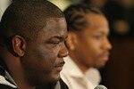 AUBURN HILLS, MI - NOVEMBER 04:  President of Basketball Operations Joe Dumars of the Detroit Pistons introduces Allen Iverson #1 at press conference after being traded from the Denver Nuggets on November 4, 2008 at the Palace of Auburn Hills in Auburn Hills, Michigan. NOTE TO USER: User expressly acknowledges and agrees that, by downloading and or using this photograph, User is consenting to the terms and conditions of the Getty Images License Agreement.  (Photo by Gregory Shamus/Getty Images)