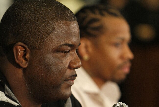 AUBURN HILLS, MI - NOVEMBER 04:  President of Basketball Operations Joe Dumars of the Detroit Pistons introduces Allen Iverson #1 at press conference after being traded from the Denver Nuggets on November 4, 2008 at the Palace of Auburn Hills in Auburn Hills, Michigan. NOTE TO USER: User expressly acknowledges and agrees that, by downloading and or using this photograph, User is consenting to the terms and conditions of the Getty Images License Agreement.  (Photo by Gregory Shamus/Getty Images)