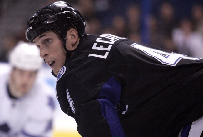 TAMPA, FL - JANUARY 25:  Vincent Lecavalier #4 of the Tampa Bay Lightning gets ready for a face-off against the Toronto Maple Leafs at St. Pete Times Forum on January 25, 2011 in Tampa, Florida.  The Lightning defeated the Leafs 2-0.  (Photo by Justin K. Aller/Getty Images)