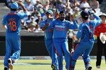 CAPE TOWN, SOUTH AFRICA - JANUARY 18: India celebrate the wicket of Graeme Smith during the 3rd One Day International match between South Africa and India from Sahara Park Newlands on January 18, 2011 in Cape Town, South Africa. (Photo by Luke Walker / Gallo Images/Getty Images)