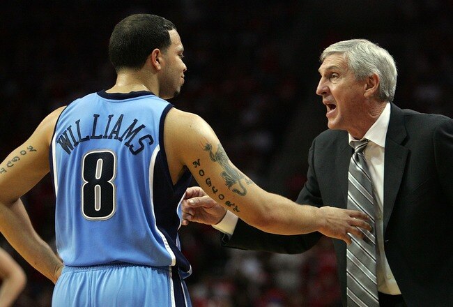 HOUSTON - MAY 5:  Head coach Jerry Sloan talks with Deron Williams #8 of the Utah Jazz in Game Seven of the Western Conference Quarterfinals during the 2007 NBA Playoffs at Toyota Center May 5, 2007 in Houston, Texas. NOTE TO USER: User expressly acknowledges and agrees that, by downloading and/or using this Photograph, user is consenting to the terms and conditions of the Getty Images License Agreement.  (Photo by Ronald Martinez/Getty Images)