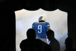 DETROIT - SEPTEMBER 20:  Quarterback Matthew Stafford #9 of the Detroit Lions runs onto the field during pregme introductions for the gamel against the Minnesota Vikings at Ford Field on September 20, 2009 in Detroit, Michigan.  (Photo by Stephen Dunn/Getty Images)