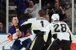 UNIONDALE, NY - FEBRUARY 11:  Micheal Haley #59 of the New York Islanders fights Brent Johnson #1 of the Pittsburgh Penguins in the third period on February 11, 2011 at Nassau Coliseum in Uniondale, New York. The Isles defeated the Pens 9-3.  (Photo by Jim McIsaac/Getty Images)