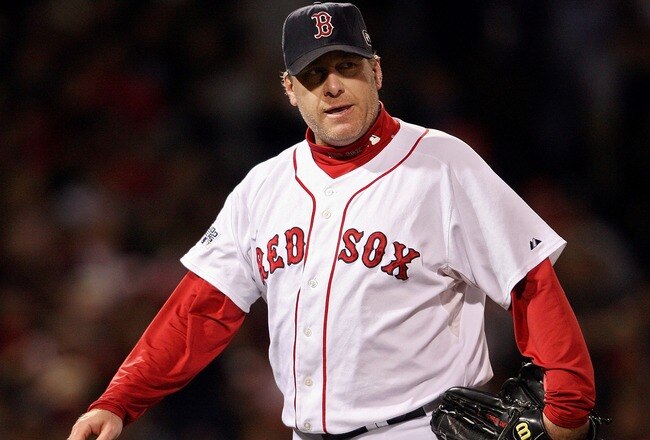 BOSTON - OCTOBER 25:  Curt Schilling #38 of the Boston Red Sox walks off the mound during Game Two of the 2007 Major League Baseball World Series against the Colorado Rockies at Fenway Park on October 25, 2007 in Boston, Massachusetts.  (Photo by Nick Laham/Getty Images)