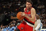 DENVER - DECEMBER 28:  Rudy Fernandez #5 of the Portland Trail Blazers dribbles the ball against the Denver Nuggets at Pepsi Center on December 28, 2010 in Denver, Colorado. The Nuggets defeated the Blazers 95-77. NOTE TO USER: User expressly acknowledges and agrees that, by downloading and or using this photograph, User is consenting to the terms and conditions of the Getty Images License Agreement.  (Photo by Doug Pensinger/Getty Images)