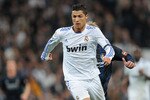 MADRID, SPAIN - FEBRUARY 06:  Cristiano Ronaldo of Real Madrid in action during the La Liga match between Real Madrid and Real Sociedad at Estadio Santiago Bernabeu on February 6, 2011 in Madrid, Spain.  (Photo by Denis Doyle/Getty Images)