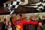 DAYTONA BEACH, FL - FEBRUARY 14:  Jamie McMurray, driver of the #1 Bass Pro Shops/Tracker Boats Chevrolet, celebrates in Victory Lane after winning the NASCAR Sprint Cup Series Daytona 500 at Daytona International Speedway on February 14, 2010 in Daytona Beach, Florida.  (Photo by Rusty Jarrett/Getty Images for NASCAR)