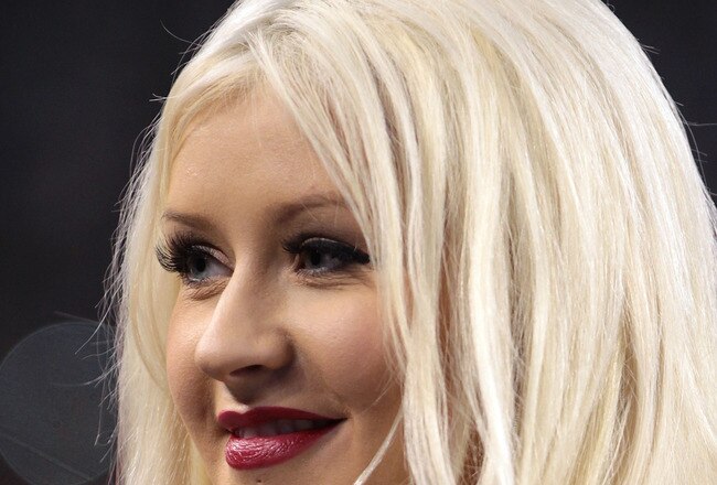 ARLINGTON, TX - FEBRUARY 06:  Singer Christina Aguilera looks on prior to singing the National Anthem during Super Bowl XLV between the Green Bay Packers and the Pittsburgh Steelers at Cowboys Stadium on February 6, 2011 in Arlington, Texas.  (Photo by Jamie Squire/Getty Images)