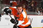 PHILADELPHIA, PA - FEBRUARY 03:  Mike Richards #18 of the Philadelphia Flyers skates during warmups before an NHL hockey game against the Nashville Predators at the Wells Fargo Center on February 3, 2011 in Philadelphia, Pennsylvania.  (Photo by Paul Bereswill/Getty Images)