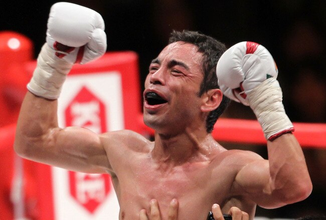 TOKYO - APRIL 30:  Fernando Montiel of Mexico celebrates after knocking out Hozumi Hasegawa of Japan during the WBC Bantamweight Title Fight between Hozumi Hasegawa and Fernando Montiel at Nippon Budokan on April 30, 2010 in Tokyo, Japan.  (Photo by Koichi Kamoshida/Getty Images)