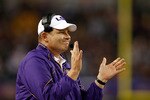 ARLINGTON, TX - JANUARY 07:  Head coach Les Miles of the Louisiana State University Tigers reacts to a field goal during the game against the Texas A&M Aggies during the AT&T Cotton Bowl at Cowboys Stadium on January 7, 2011 in Arlington, Texas.  (Photo by Chris Graythen/Getty Images)
