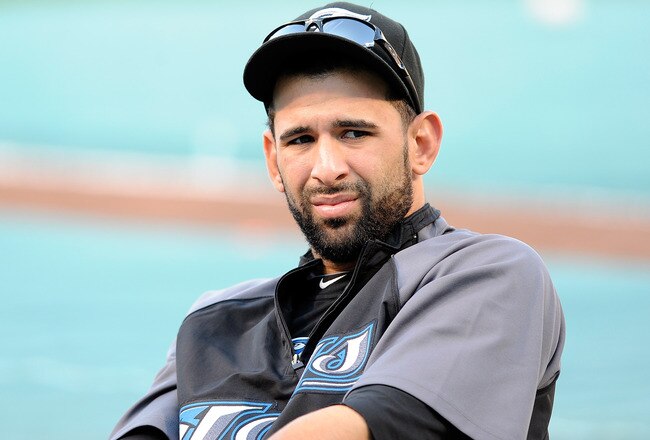 BALTIMORE - SEPTEMBER 13:  Jose Bautista #19 of the Toronto Blue Jays warms up before the game against the Baltimore Orioles at Camden Yards on September 13, 2010 in Baltimore, Maryland.  (Photo by Greg Fiume/Getty Images)