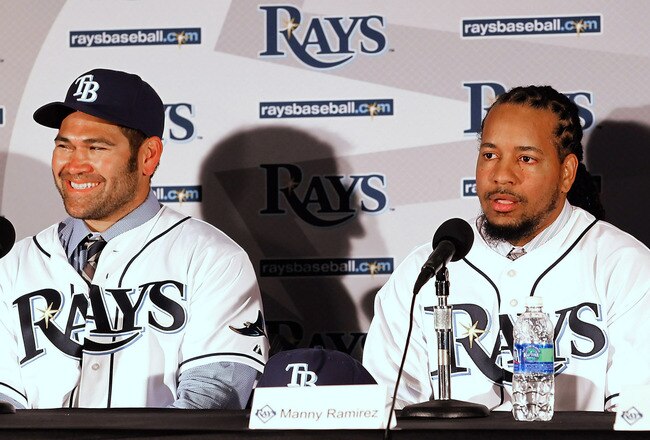ST PETERSBURG, FL - FEBRUARY 01:  Johnny Damon #22 and Manny Ramirez #24 of the Tampa Bay Rays talk with reporters at a press conference at Tropicana Field on February 1, 2011 in St Petersburg, Florida.  (Photo by J. Meric/Getty Images)