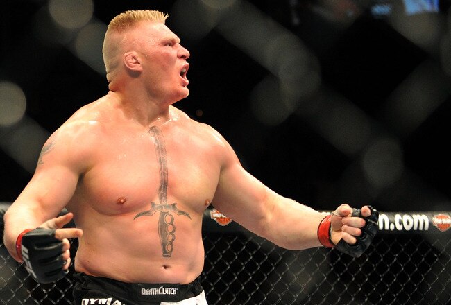LAS VEGAS - JULY 11:  Brock Lesnar reacts after knocking out Frank Mir during their heavyweight title bout during UFC 100 on July 11, 2009 in Las Vegas, Nevada.  (Photo by Jon Kopaloff/Getty Images)