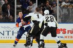UNIONDALE, NY - FEBRUARY 11:  Micheal Haley #59 of the New York Islanders fights Brent Johnson #1 of the Pittsburgh Penguins in the third period on February 11, 2011 at Nassau Coliseum in Uniondale, New York. The Isles defeated the Pens 9-3.  (Photo by Jim McIsaac/Getty Images)