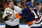 UNIONDALE, NY - FEBRUARY 11:  Trevor Gillies #14 of the New York Islanders fights Eric Godard #28 of the Pittsburgh Penguins on February 11, 2011 at Nassau Coliseum in Uniondale, New York. The Isles defeated the Pens 9-3.  (Photo by Jim McIsaac/Getty Images)