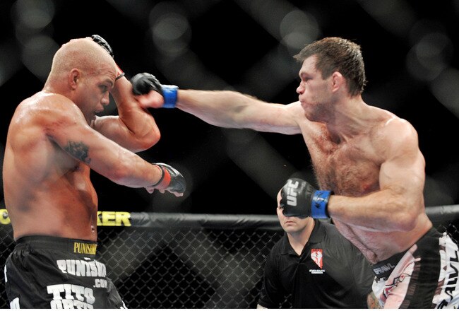 LAS VEGAS - NOVEMBER 21: Tito Ortiz (L) battles Forrest Griffin (R) during their Light Heavyweight Fight at the UFC 106 at Mandalay Bay Events Center on November 21, 2009 in Las Vegas, Nevada. (Photo by Jon Kopaloff/Getty Images)